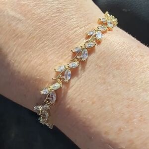 NWT Marquise CZ Leaf Gold Plated Brass Tennis Bracelet. Measures 6.7 inches long